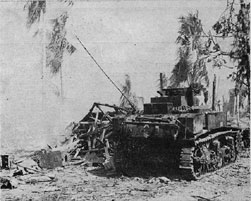 Light tank fires at Jap position on Kwajalein Island as the 7th Division moved in during recent brilliant campaign. Bitter fighting blasted the Japs.